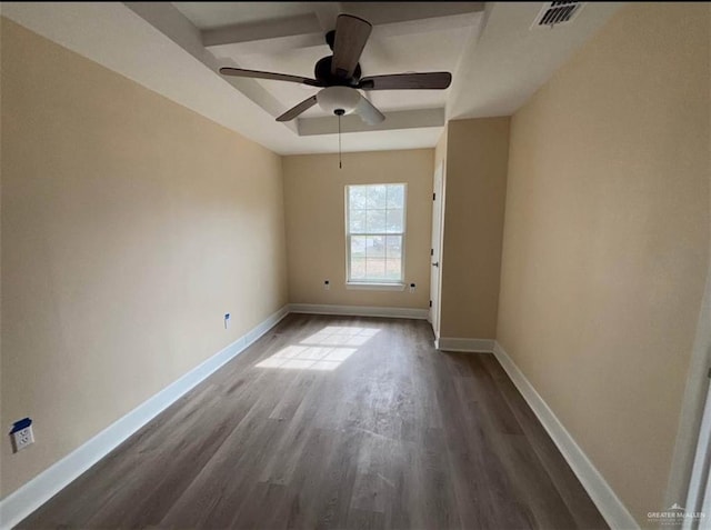 2505 W Bella Vista Ave W, Alton, TX 78573 - spare room featuring dark wood finished floors, baseboards, and a ceiling fan