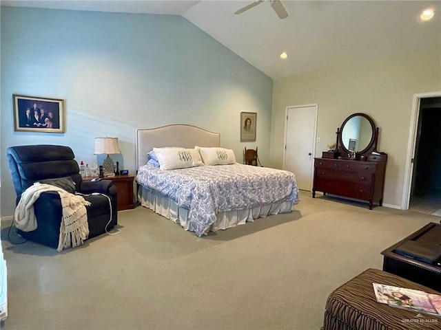 bedroom featuring ceiling fan, lofted ceiling, and light carpet