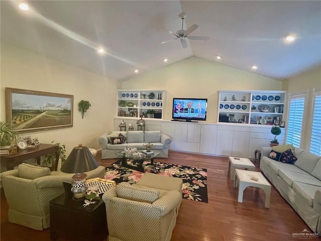 living room with vaulted ceiling, hardwood / wood-style floors, and ceiling fan