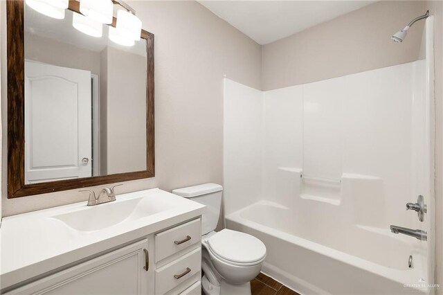 3838 View Point Dr, Edinburg, TX 78542 - bathroom featuring shower / bathing tub combination, toilet, and vanity