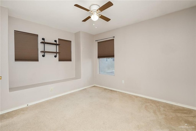 3838 View Point Dr, Edinburg, TX 78542 - spare room featuring carpet floors, a ceiling fan, and baseboards