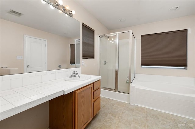 3838 View Point Dr, Edinburg, TX 78542 - full bathroom with a garden tub, tile patterned floors, a stall shower, vanity, and visible vents