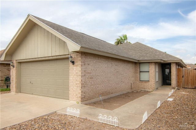 single story home with a garage