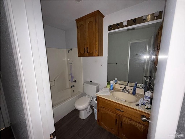 full bathroom featuring vanity, toilet, tub / shower combination, and wood-type flooring