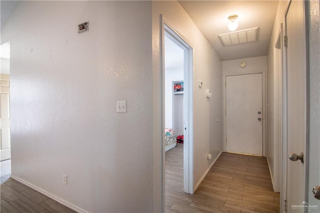 hall featuring light hardwood / wood-style floors