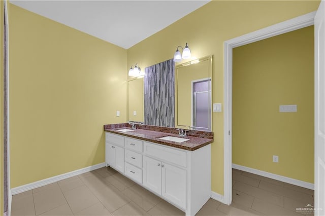 bathroom with vanity and tile patterned floors