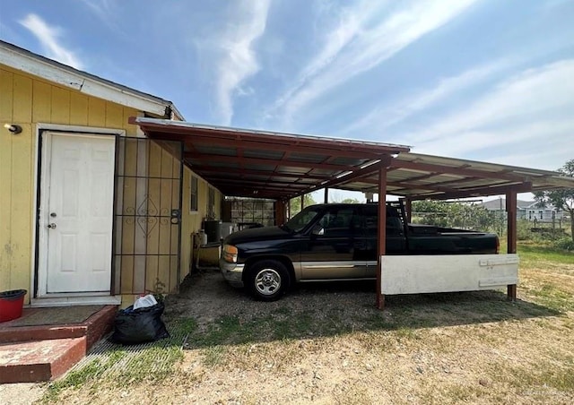 view of car parking with a carport