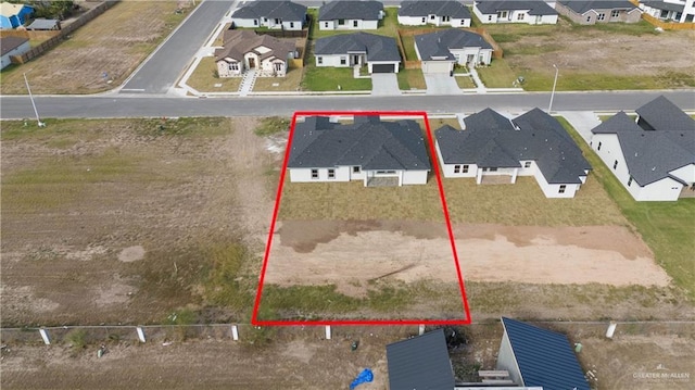 1405 Helen Dr, Weslaco, TX 78599 - aerial perspective of suburban area with property parcel outlined