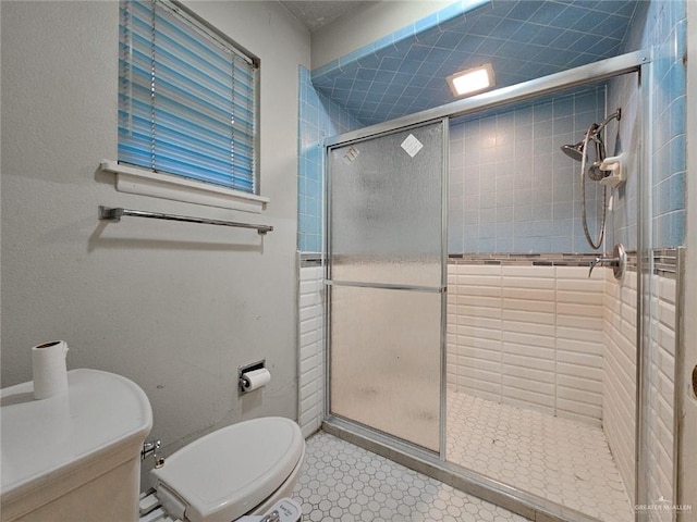 905 E Ithaca Ave, Mcallen, TX 78501 - full bath featuring toilet, a stall shower, and baseboards
