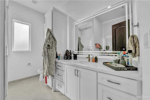 full bath with vanity, toilet, baseboards, and visible vents