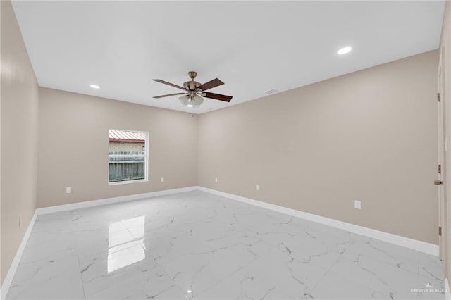 410 W 7th St, San Juan, TX 78589 - spare room with ceiling fan, light marble finish floors, and recessed lighting