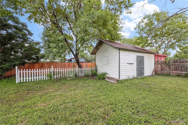 410 W 7th St, San Juan, TX 78589 - fenced backyard featuring an outbuilding