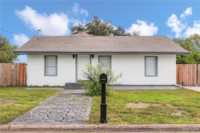 410 W 7th St, San Juan, TX 78589 - ranch-style house featuring stucco siding