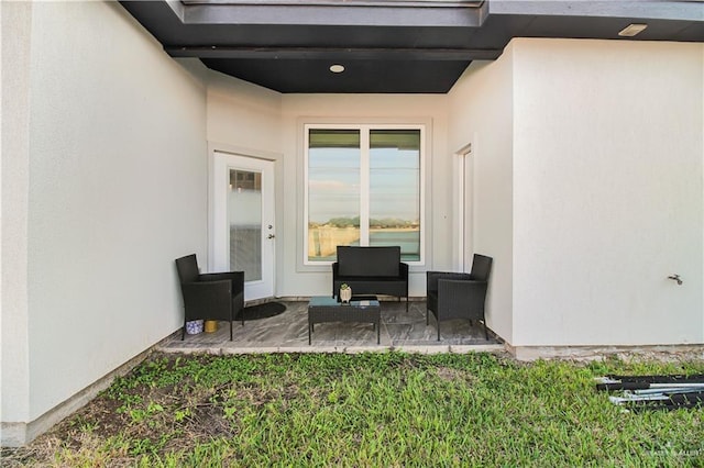 doorway to property featuring a patio