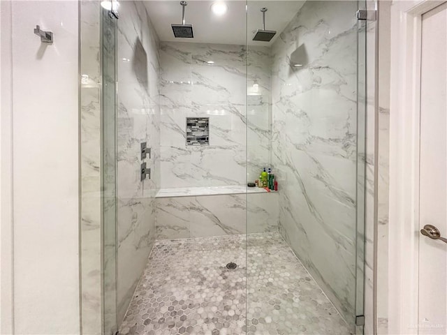 bathroom featuring an enclosed shower