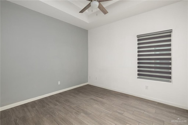 907 W Carmel Ave, Pharr, TX 78577 - empty room with a ceiling fan, wood finished floors, and baseboards