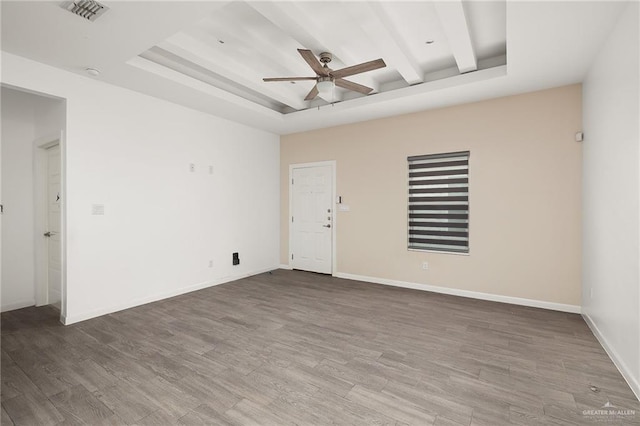 907 W Carmel Ave, Pharr, TX 78577 - empty room featuring ceiling fan, a raised ceiling, wood finished floors, and baseboards