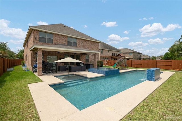 view of swimming pool featuring a patio, a fenced in pool, a fenced backyard, a lawn, and outdoor lounge area