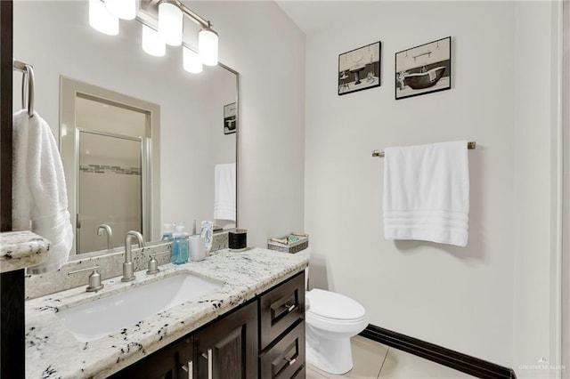 full bathroom with tile patterned floors, vanity, toilet, and an enclosed shower