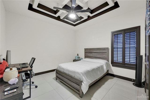 tiled bedroom featuring ceiling fan, baseboards, and coffered ceiling