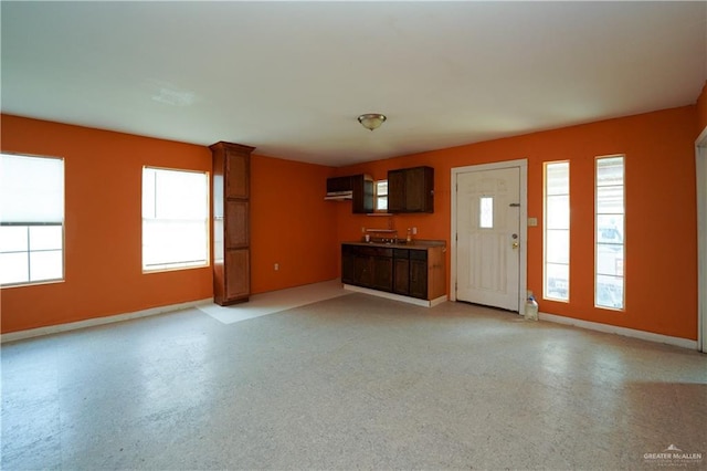 24834 Birch St, San Benito, TX 78586 - unfurnished living room featuring baseboards