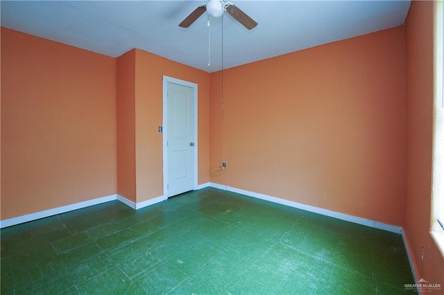24834 Birch St, San Benito, TX 78586 - empty room with baseboards and a ceiling fan