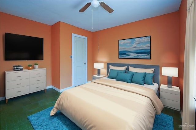 24834 Birch St, San Benito, TX 78586 - bedroom featuring baseboards and ceiling fan
