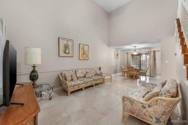 living room with a high ceiling