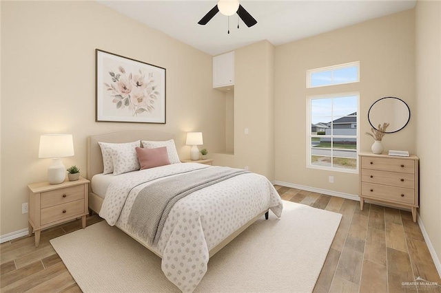 1008 Magnolia St, Mission, TX 78573 - bedroom featuring light wood-type flooring, baseboards, and ceiling fan