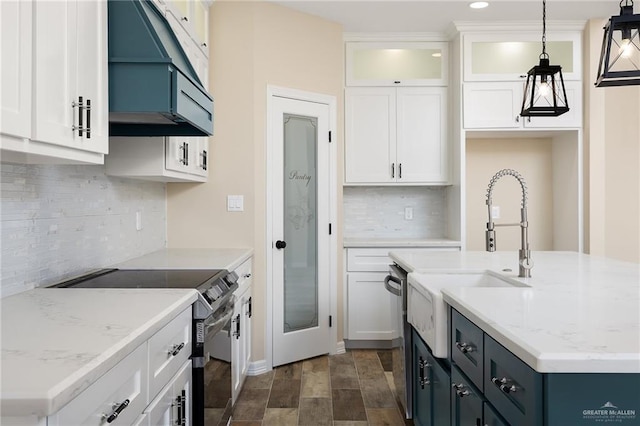 1008 Magnolia St, Mission, TX 78573 - kitchen featuring stainless steel appliances, backsplash, white cabinetry, and recessed lighting