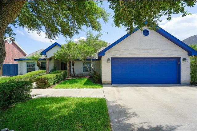 4010 Blackhawk St, Edinburg, TX 78539 - ranch-style house featuring an attached garage, driveway, and a front yard