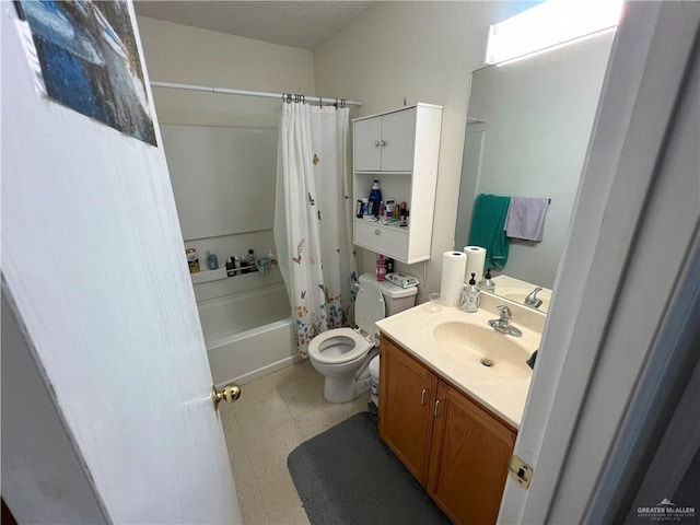 full bathroom with a textured ceiling, vanity, toilet, and shower / bath combo with shower curtain