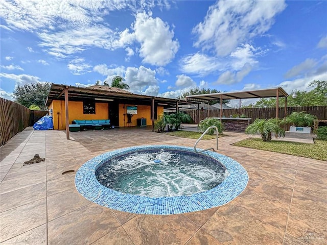 view of swimming pool featuring central AC, a patio area, and an outdoor hot tub