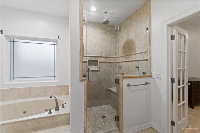 bathroom featuring plus walk in shower