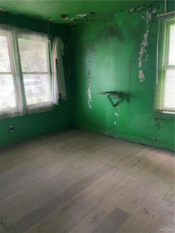 408 E Gardenia Ave, Hidalgo, TX 78557 - spare room featuring hardwood / wood-style flooring