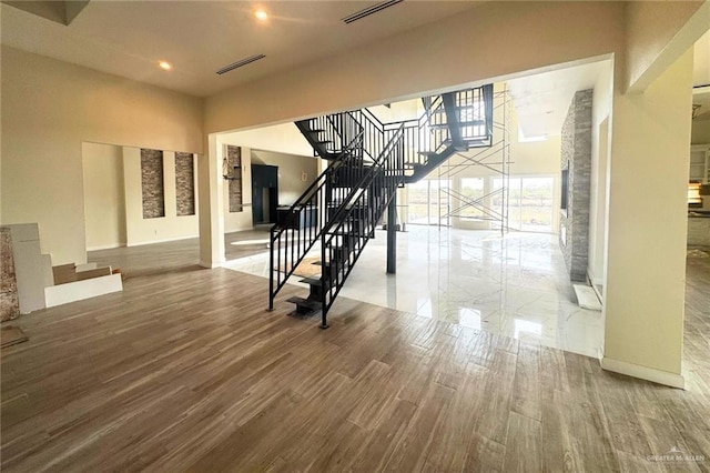 foyer entrance featuring wood-type flooring