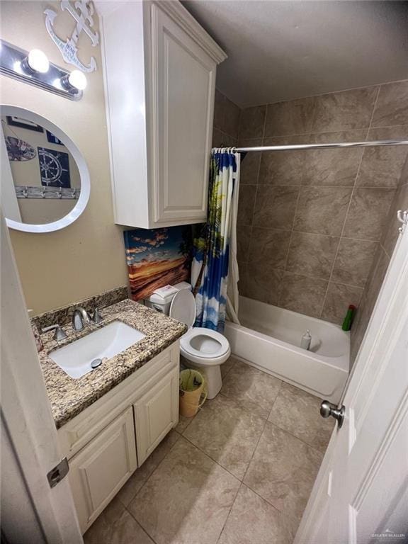 full bathroom with tile patterned flooring, vanity, toilet, and shower / bath combo with shower curtain