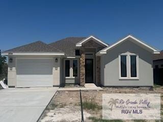 2906 Brushy Ct, Harlingen, TX 78552 - ranch-style home with concrete driveway and a garage