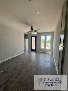 2906 Brushy Ct, Harlingen, TX 78552 - spare room with dark wood finished floors, baseboards, and a ceiling fan