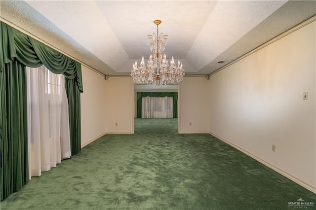 unfurnished room with carpet floors, vaulted ceiling, and a notable chandelier