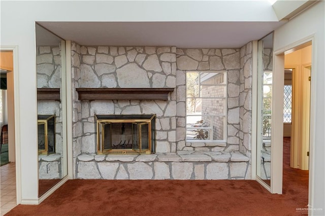 details featuring carpet and a fireplace