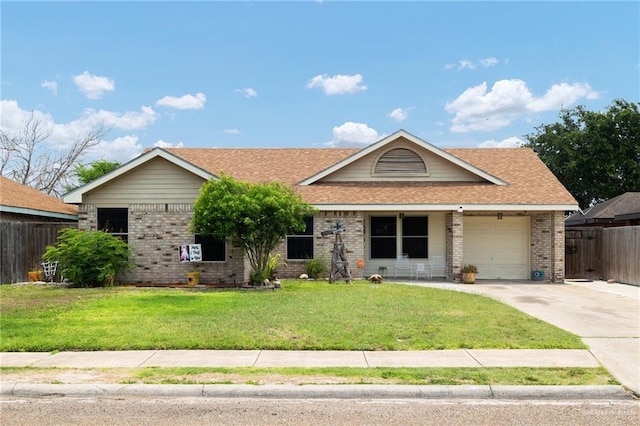 2113 W Harrison St, Weslaco, TX 78599 - ranch-style home with brick siding, an attached garage, driveway, and a shingled roof
