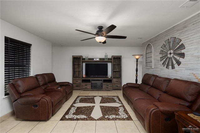 2113 W Harrison St, Weslaco, TX 78599 - tiled living room with a ceiling fan