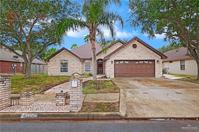 view of front of property with a garage