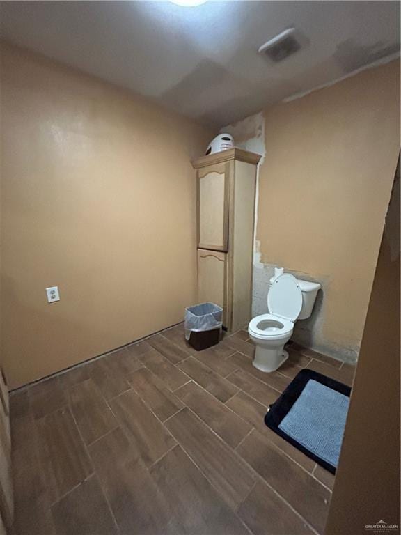 bathroom featuring toilet