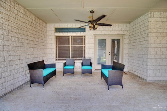 view of patio / terrace featuring french doors and ceiling fan