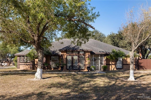 view of front of home with a front lawn