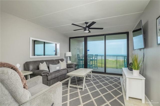 living room featuring a ceiling fan