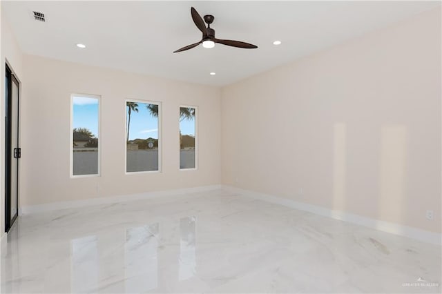 unfurnished room featuring ceiling fan