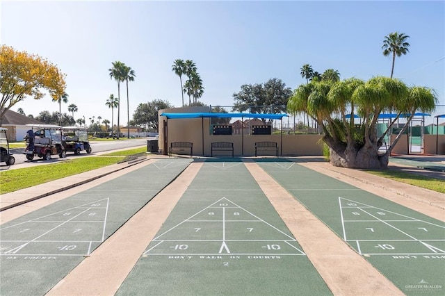 view of home's community with shuffleboard